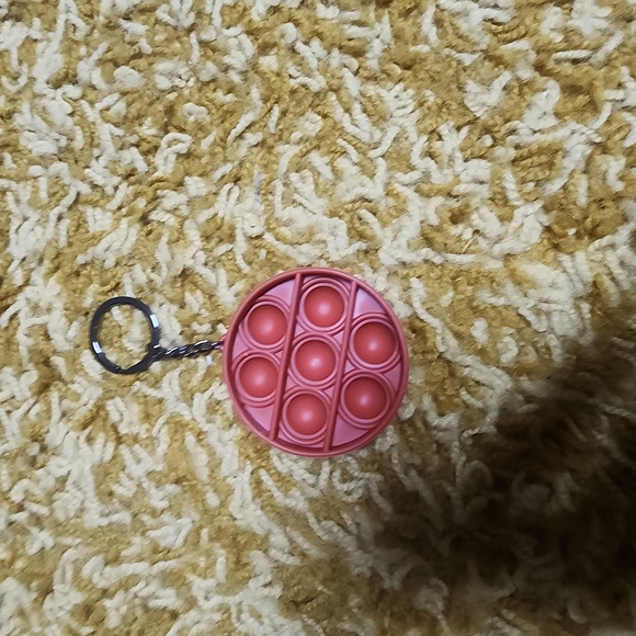 Round Pink Fidget Keychain - Picture 2 of 3
